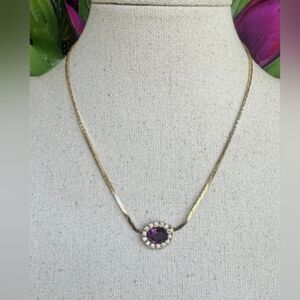 Elegant Gold Necklace with Purple Gemstone